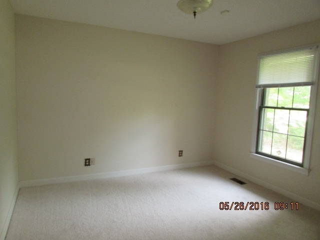 5835 Huddersfield Road Macon, GA 31210 - Photo 16 of 19 an empty room with a window