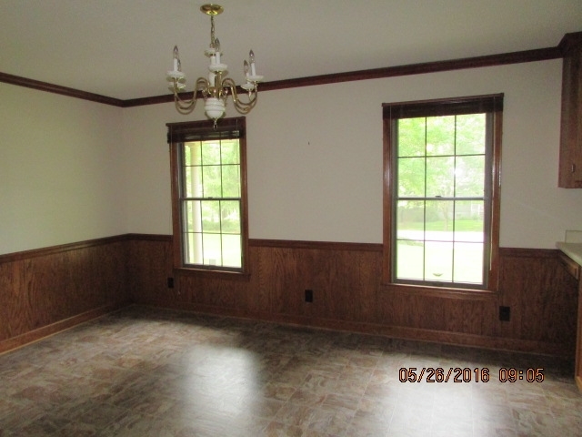 5835 Huddersfield Road Macon, GA 31210 - Photo 4 of 19 a view of an empty room with a window