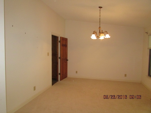 5835 Huddersfield Road Macon, GA 31210 - Photo 7 of 19 a view of a room that has a chandelier