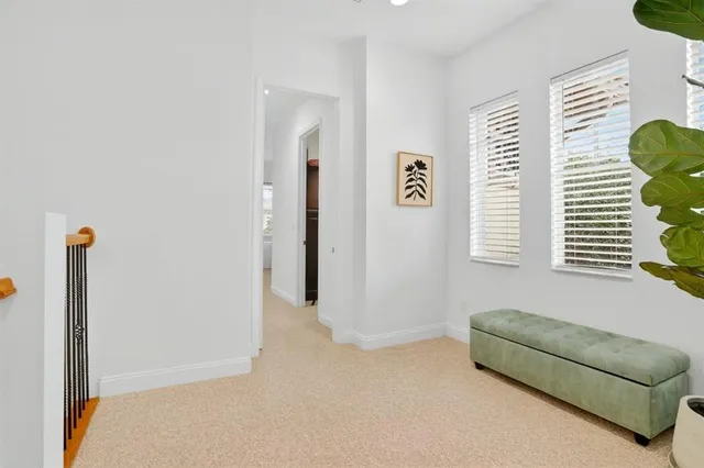 a view of livingroom with furniture and a window