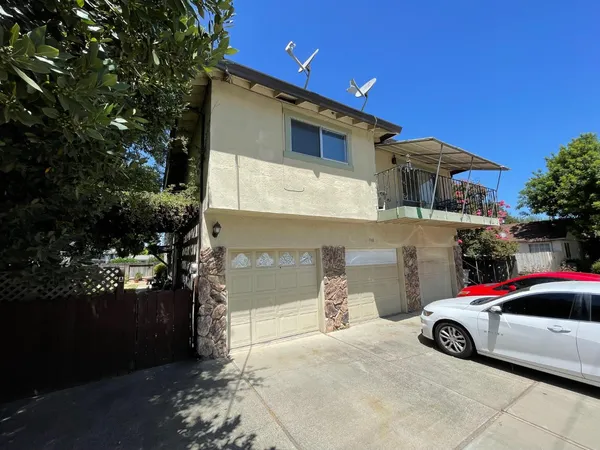 a car parked in front of a house