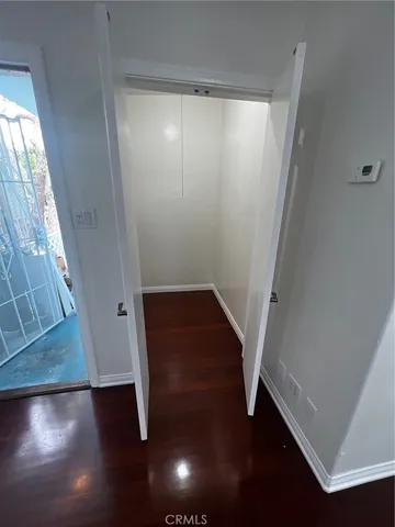 a view of entryway with wooden floor
