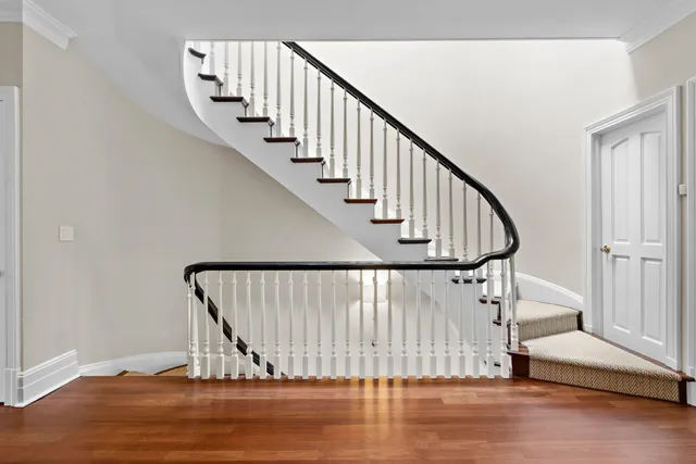 a view of entryway with wooden floor