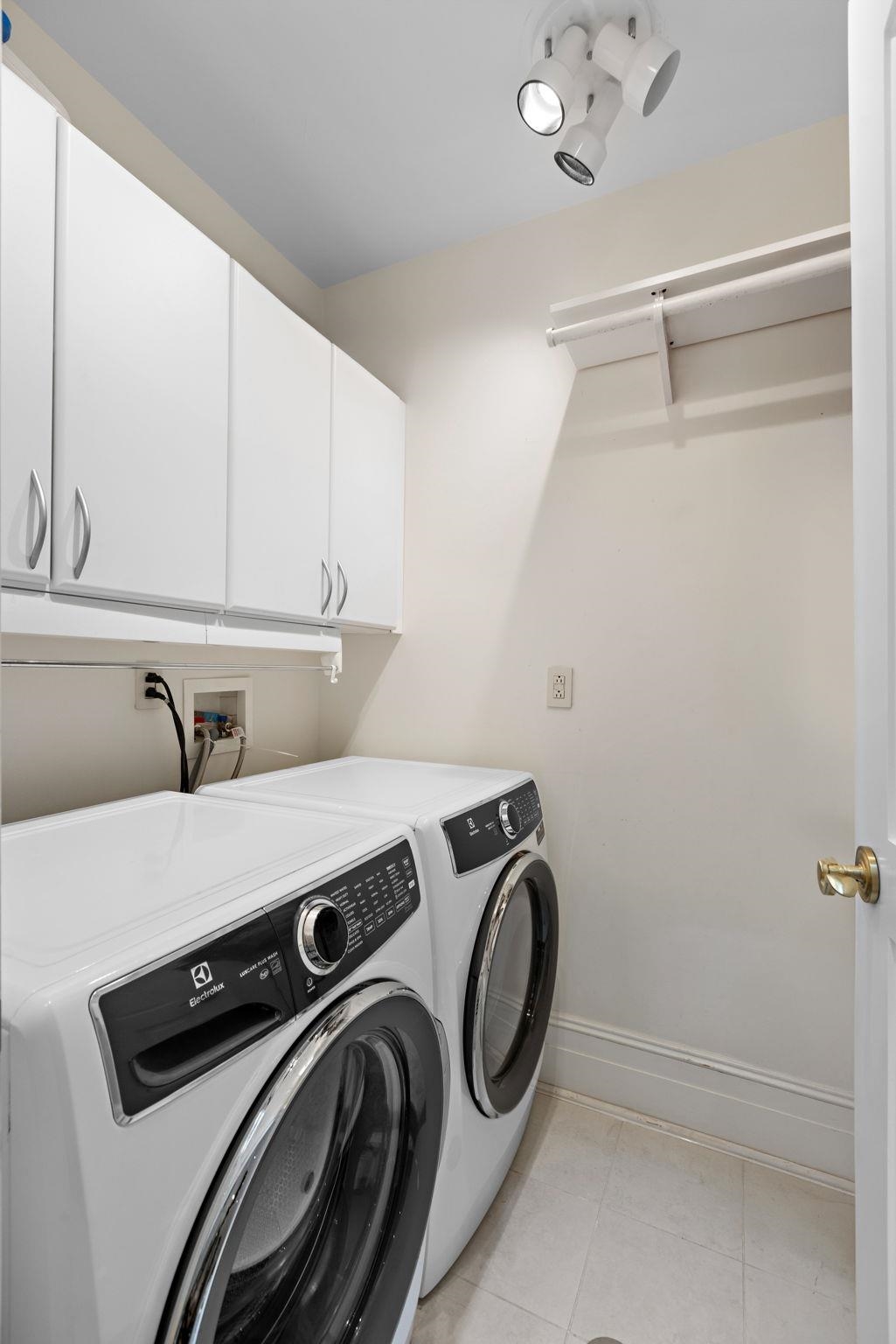 630 Hudson Street Hoboken, NJ 07030 - Photo 23 of 50 a utility room with dryer and washer