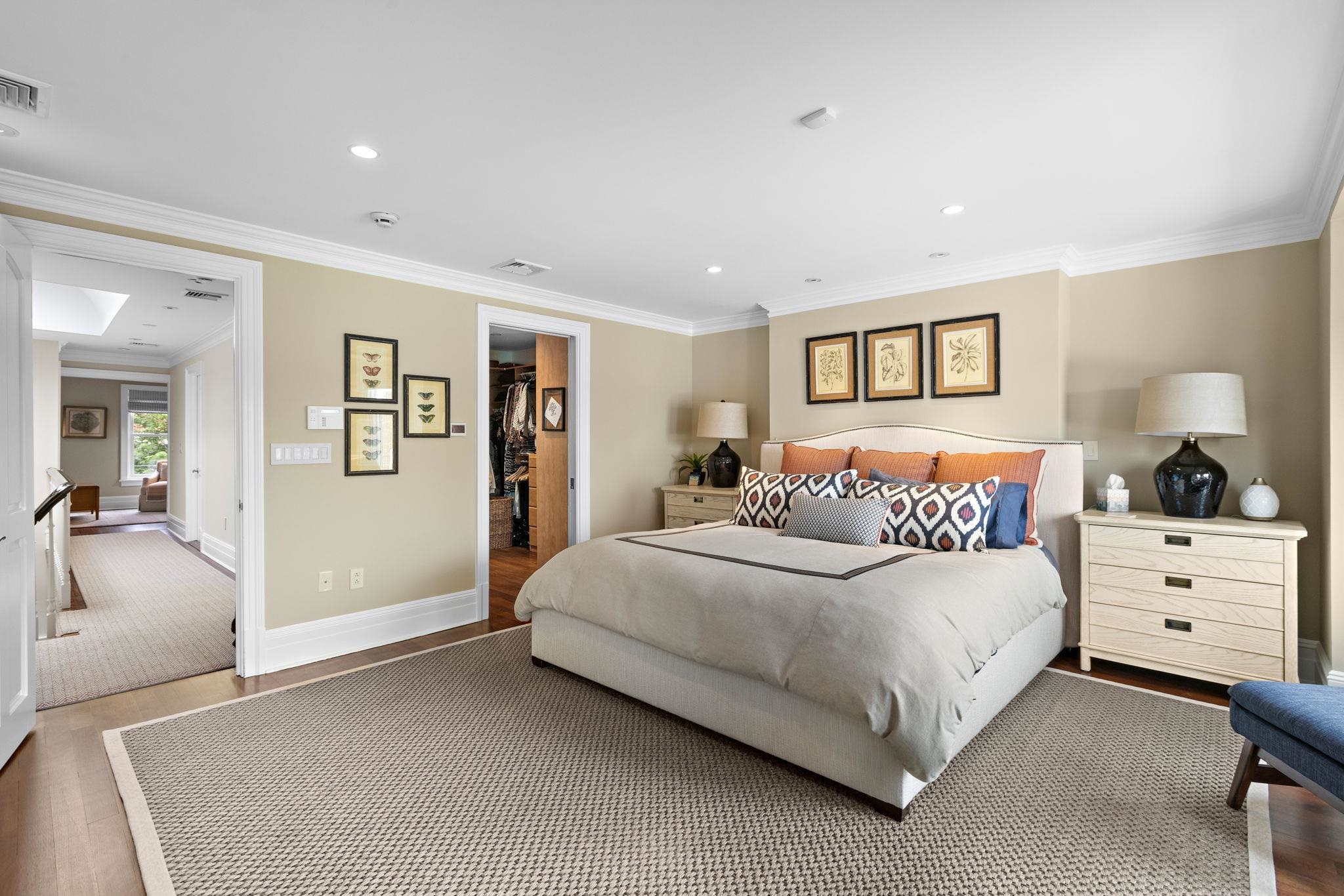 630 Hudson Street Hoboken, NJ 07030 - Photo 29 of 50 a bedroom with a bed and a couch