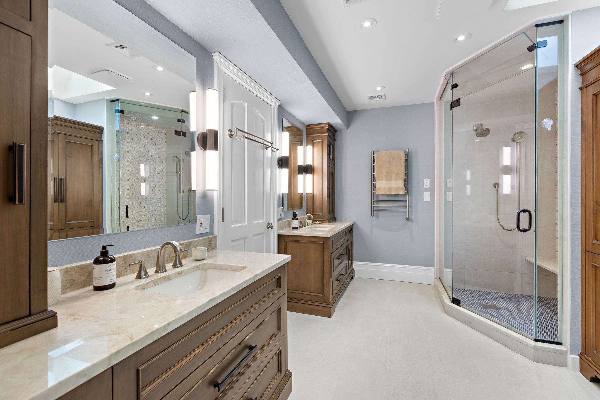 630 Hudson Street Hoboken, NJ 07030 - Photo 33 of 50 a bathroom with a granite countertop sink mirror and shower