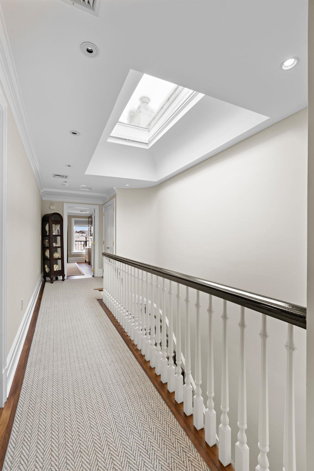 630 Hudson Street Hoboken, NJ 07030 - Photo 37 of 50 a view of a hallway with wooden floor