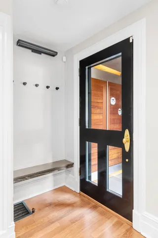 a view of a room that has a bed and a window