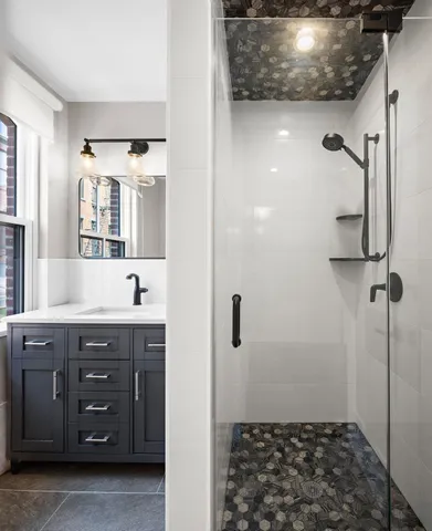 a bathroom with a sink and a mirror