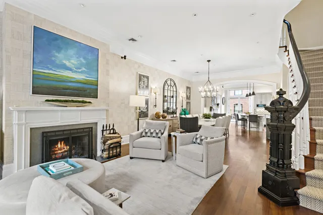 a living room with furniture fireplace and flat screen tv