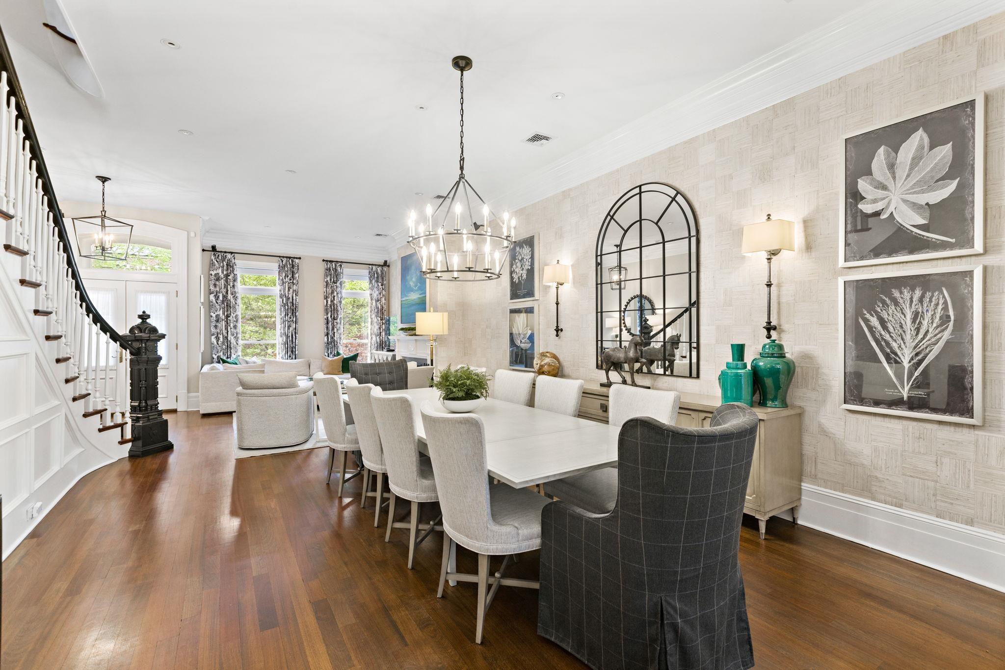 630 Hudson Street Hoboken, NJ 07030 - Photo 9 of 50 a view of a dining room with furniture a chandelier and wooden floor