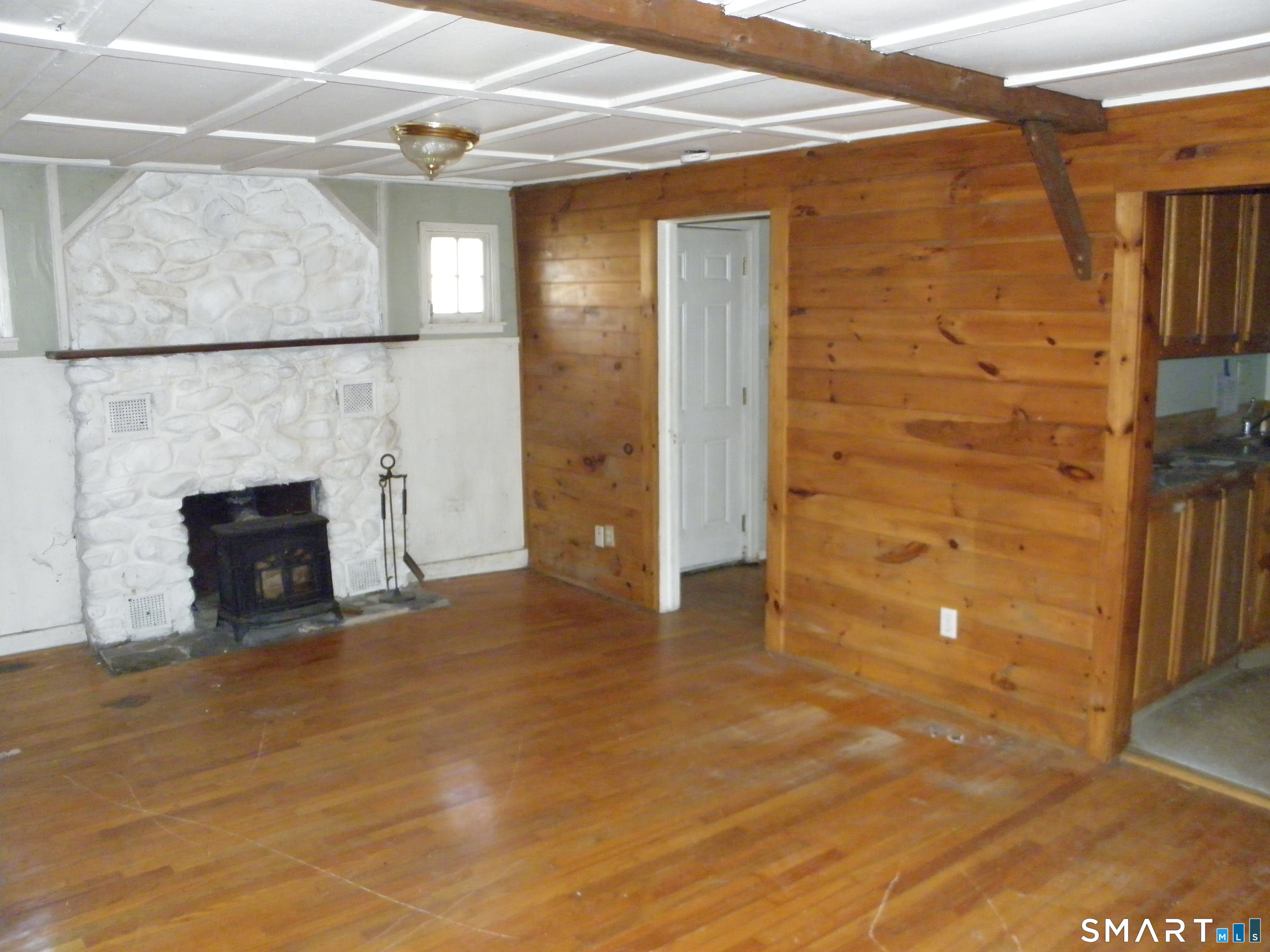 27 Fox Trail Coventry, CT 06238 - Photo 8 of 13 a view of empty room with a fireplace