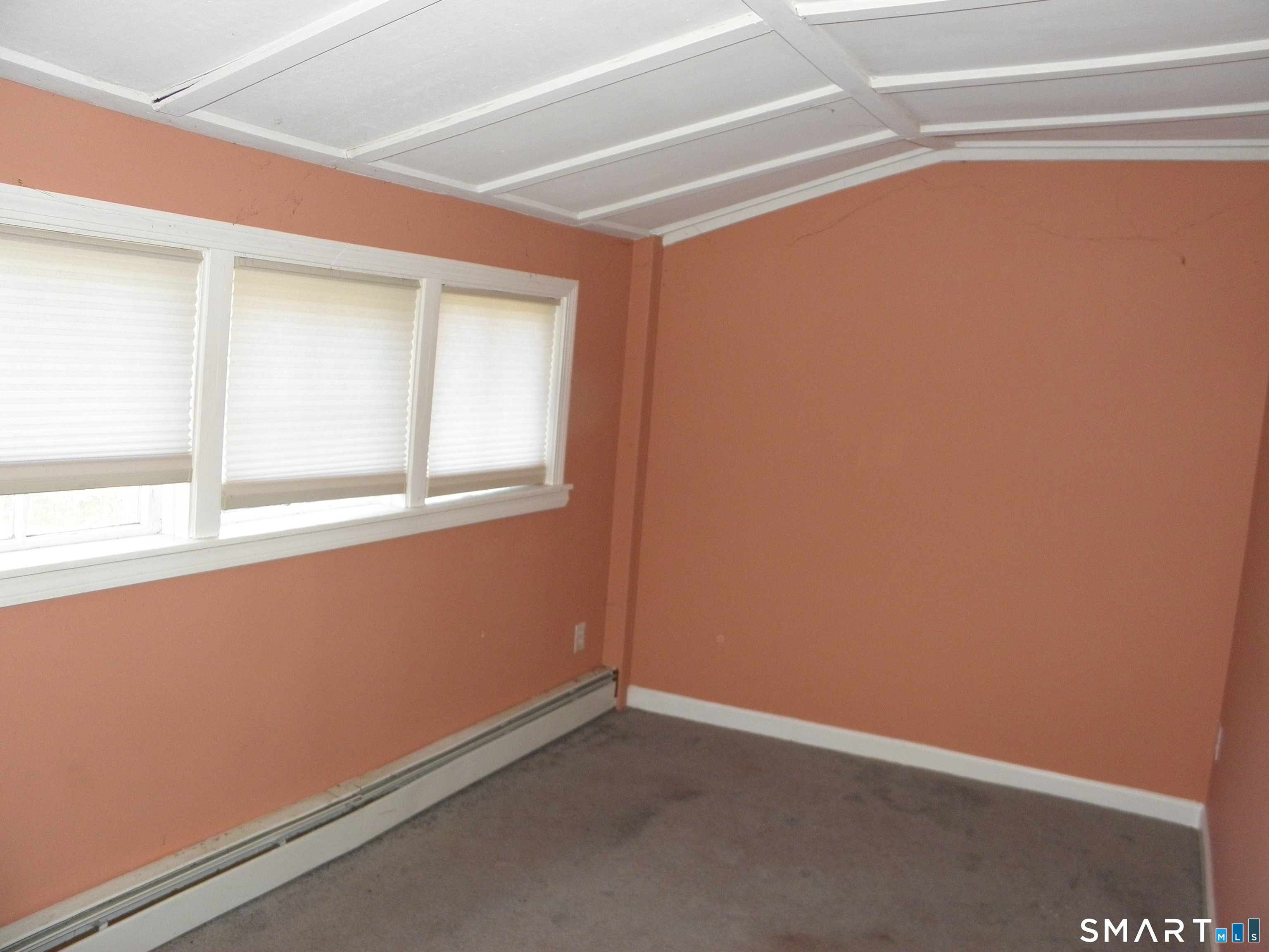 27 Fox Trail Coventry, CT 06238 - Photo 9 of 13 a view of an empty room with a window