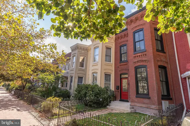 a front view of a multi story residential apartment buildings