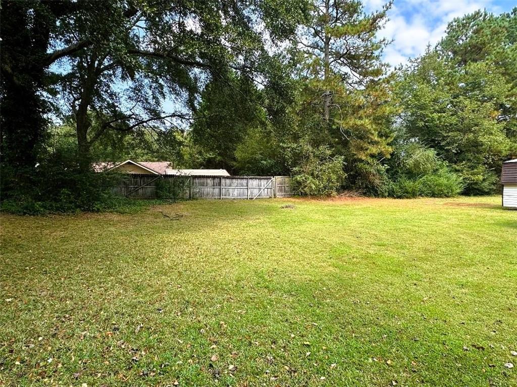 121 Hunt Drive Calhoun, GA 30701 - Photo 20 of 20 a view of a swimming pool with an outdoor space and seating area
