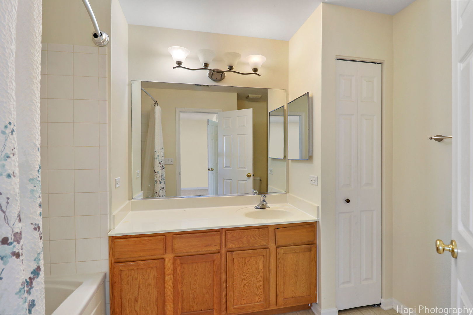 5332 Wildspring Drive, Unit 5332 Lake In The Hills, IL 60156 - Photo 15 of 29 a bathroom with a double vanity sink and a mirror