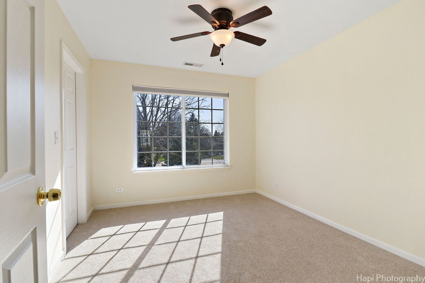 5332 Wildspring Drive, Unit 5332 Lake In The Hills, IL 60156 - Photo 19 of 29 a view of an empty room with a window