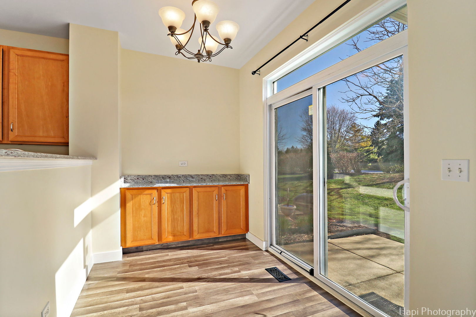 5332 Wildspring Drive, Unit 5332 Lake In The Hills, IL 60156 - Photo 5 of 29 a view of a room with a window and wooden floor