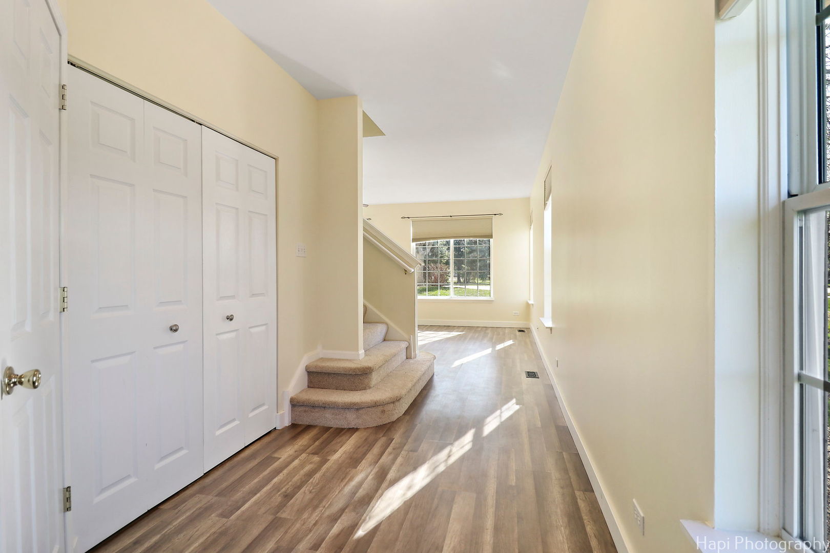 5332 Wildspring Drive, Unit 5332 Lake In The Hills, IL 60156 - Photo 10 of 29 a view of a bedroom with wooden floor and chair