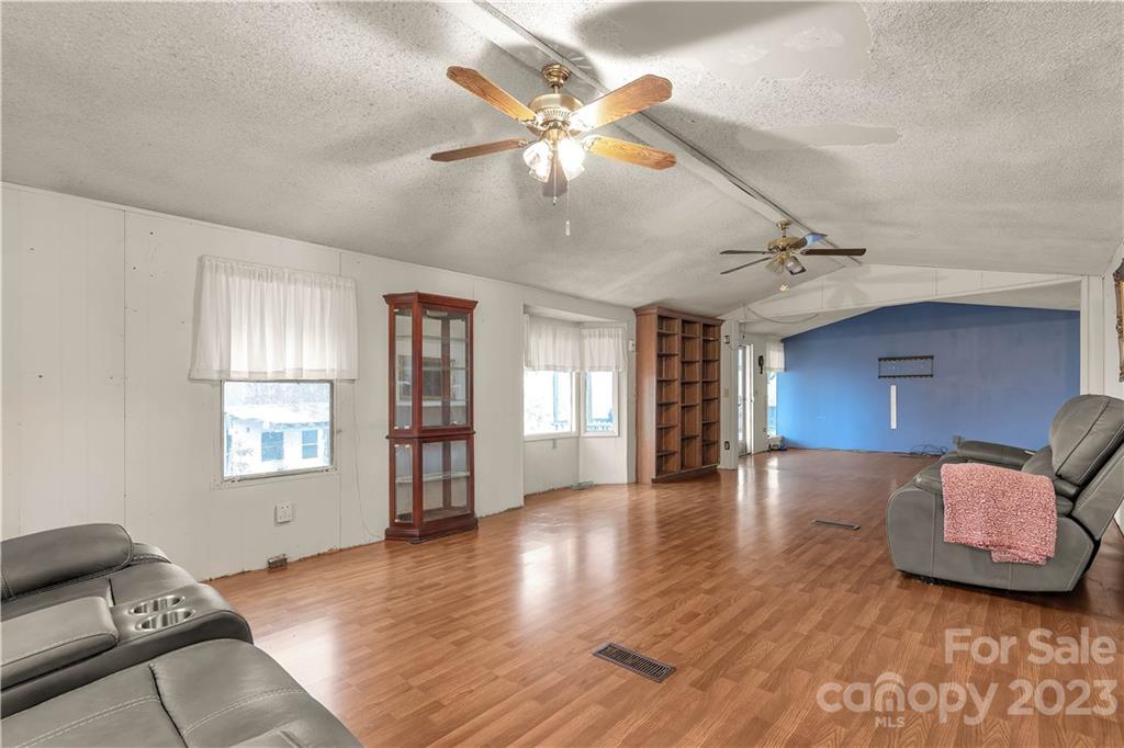 853 Enon Church Road Blacksburg, SC 29702 - Photo 7 of 29 a view of livingroom and hardwood floor