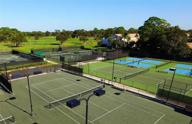 an aerial view of a golf course with a yard