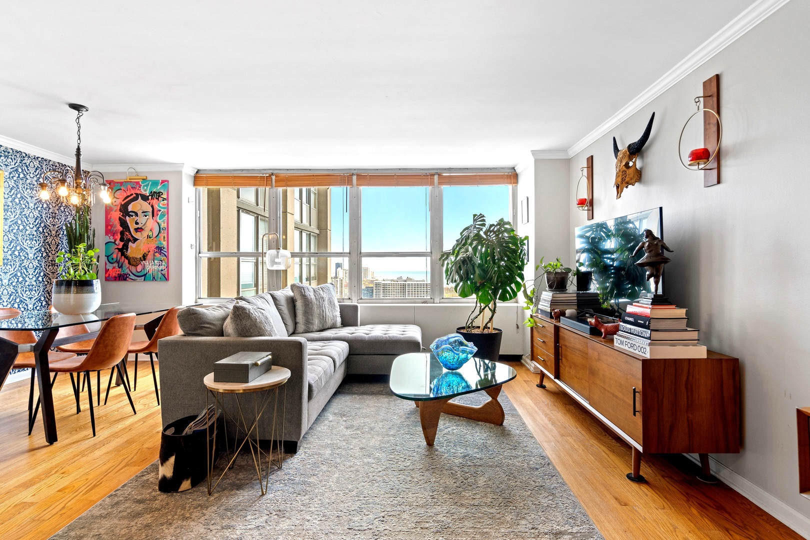655 West Irving Park Road, Unit 3608 Chicago, IL 60613 - Photo 13 of 37 a living room with furniture and a large window