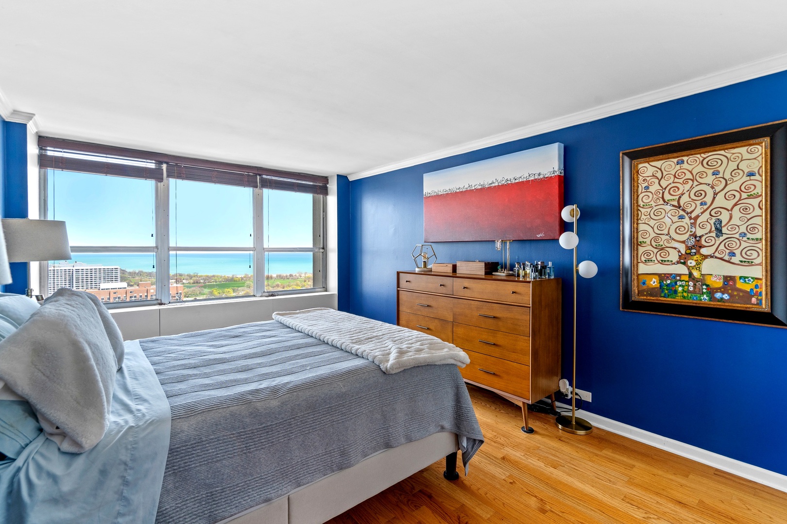 655 West Irving Park Road, Unit 3608 Chicago, IL 60613 - Photo 15 of 37 a bed room with a bed tv and a window