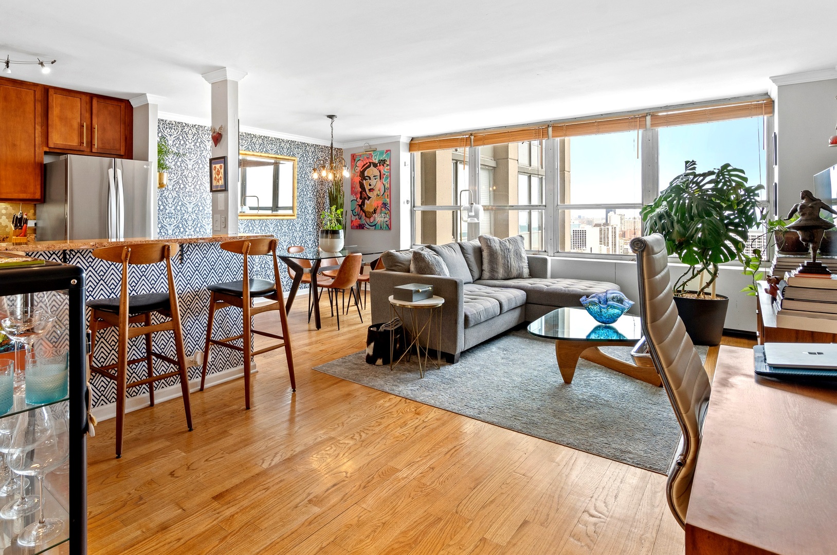 655 West Irving Park Road, Unit 3608 Chicago, IL 60613 - Photo 2 of 37 a living room with furniture and a large window