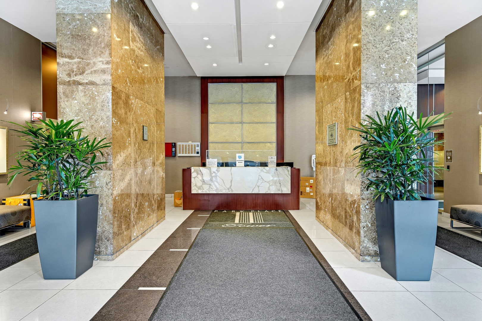 655 West Irving Park Road, Unit 3608 Chicago, IL 60613 - Photo 22 of 37 a bathroom with a tub shower and a potted plant