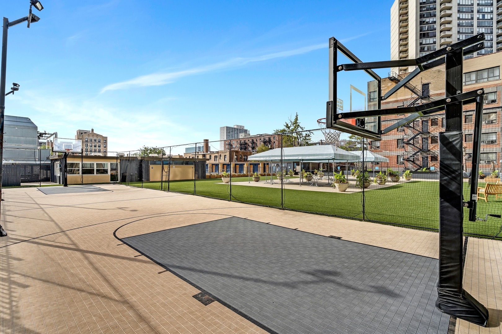 655 West Irving Park Road, Unit 3608 Chicago, IL 60613 - Photo 27 of 37 a view of a volley ball court