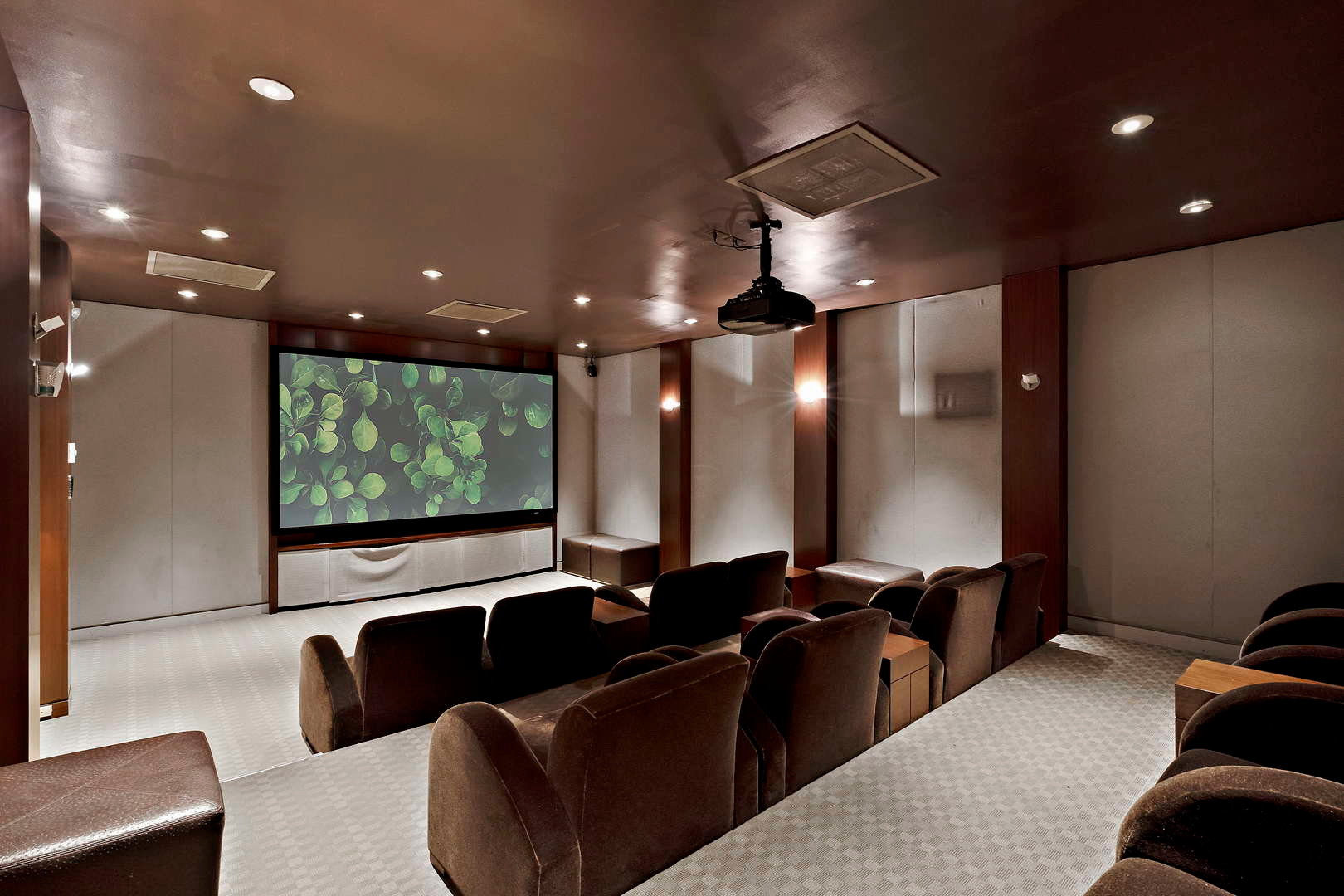655 West Irving Park Road, Unit 3608 Chicago, IL 60613 - Photo 35 of 37 a living room with furniture and a projector screen