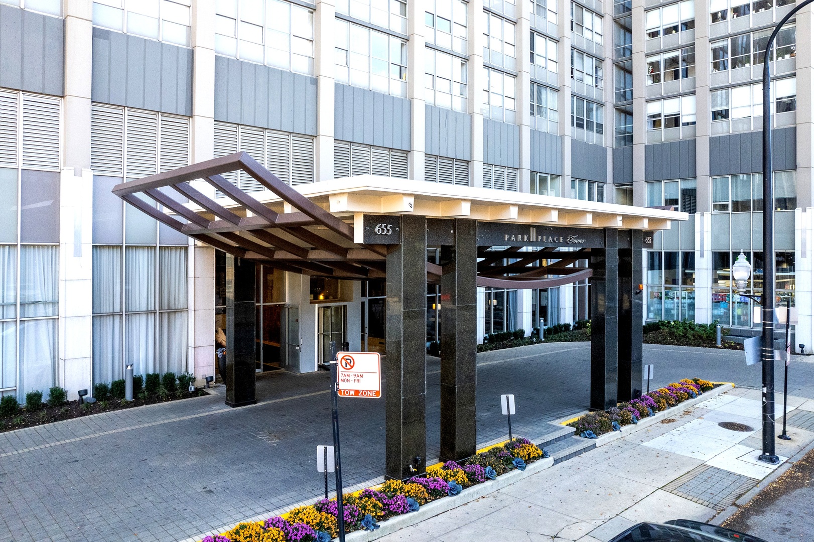 655 West Irving Park Road, Unit 3608 Chicago, IL 60613 - Photo 36 of 37 a view of tall building with a outdoor space