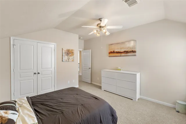 a en suite bathroom with a sink double vanity and a mirror
