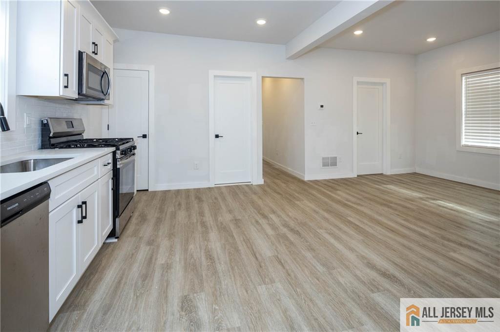 27 South 2nd Street Fords, NJ 08863 - Photo 10 of 33 a view of a kitchen with electric appliances