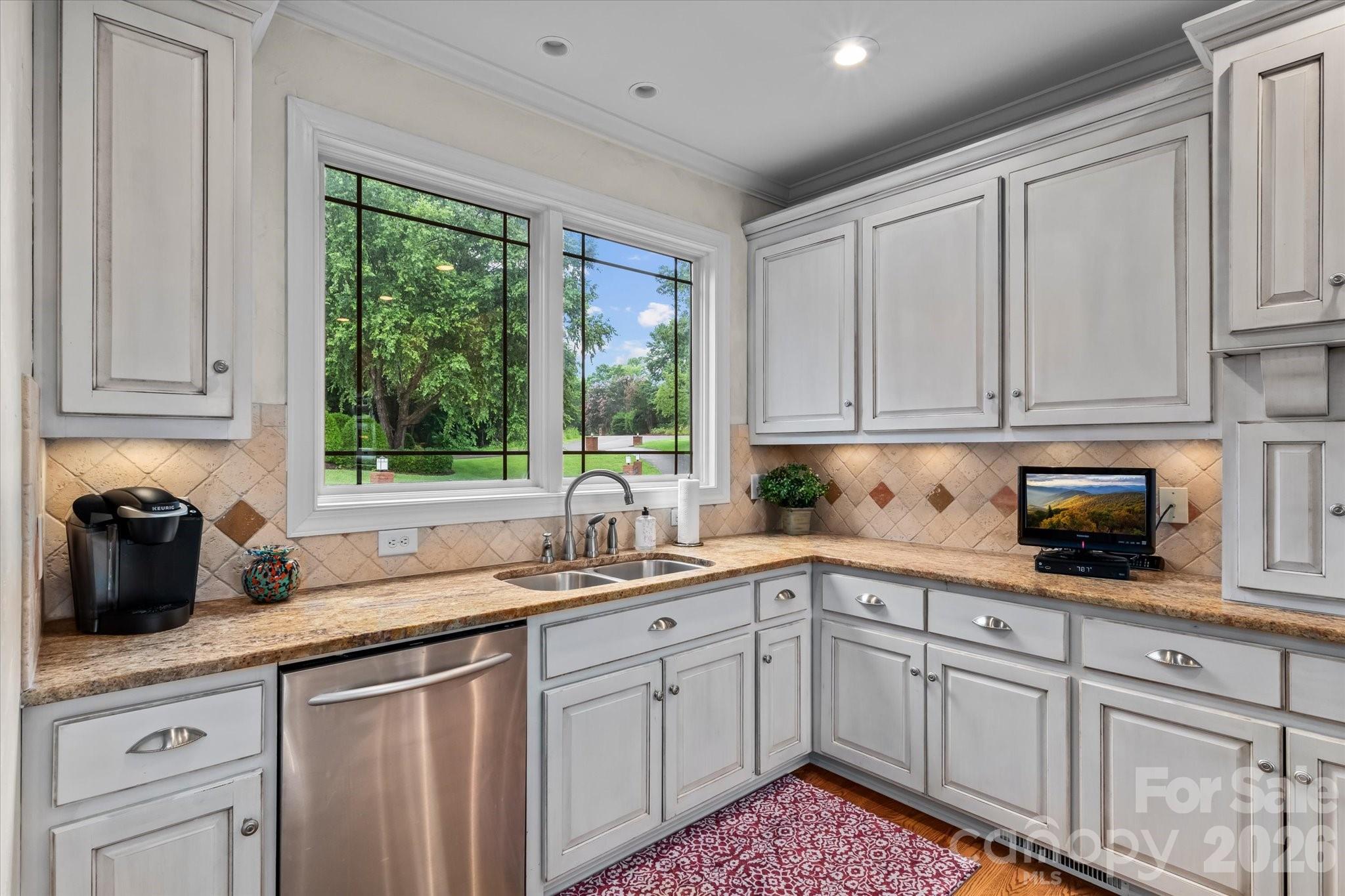 368 Players Ridge Road Hickory, NC 28601 - Photo 14 of 48 a kitchen with sink cabinets and window