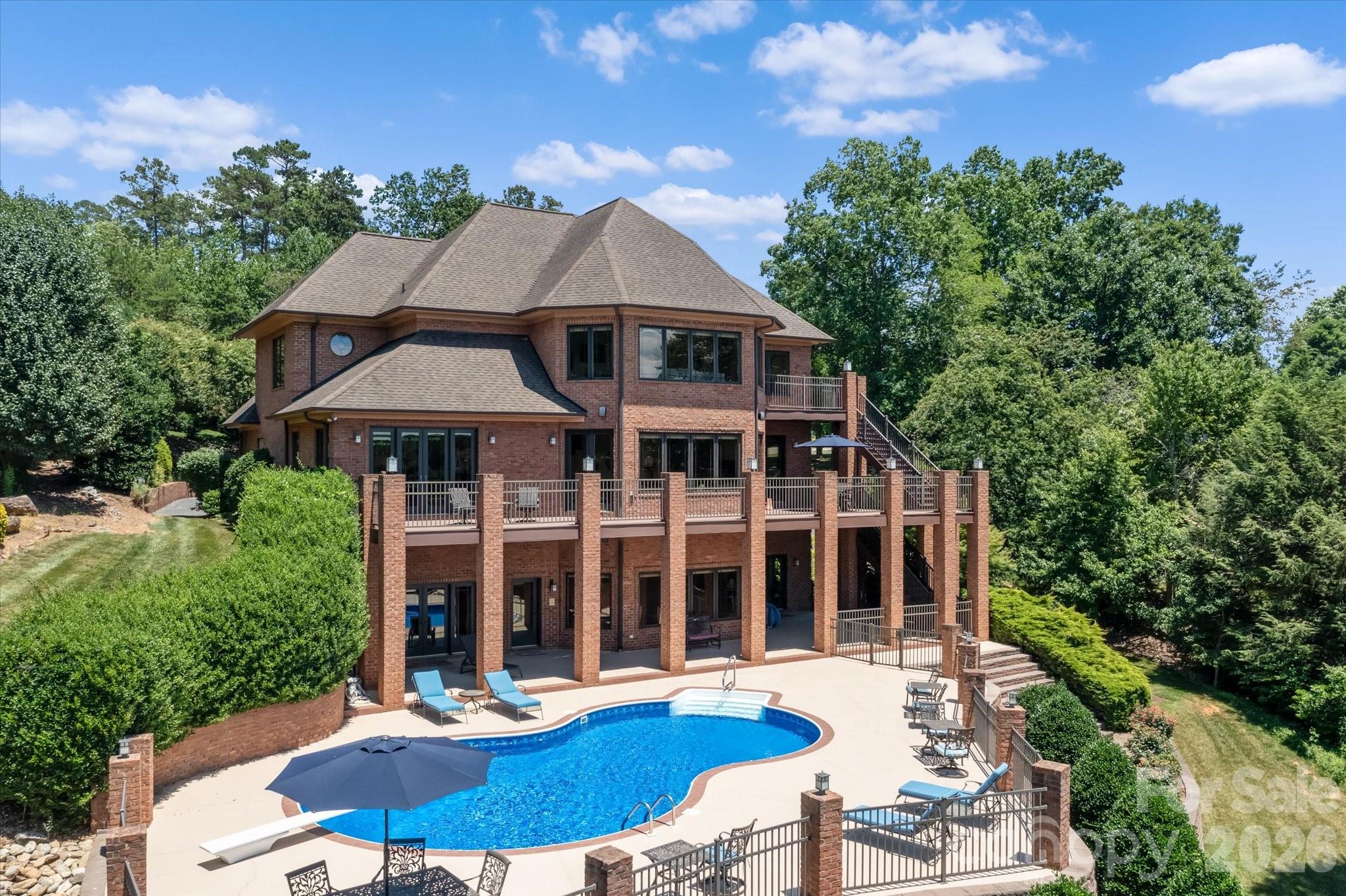 368 Players Ridge Road Hickory, NC 28601 - Photo 2 of 48 a front view of a house with a yard