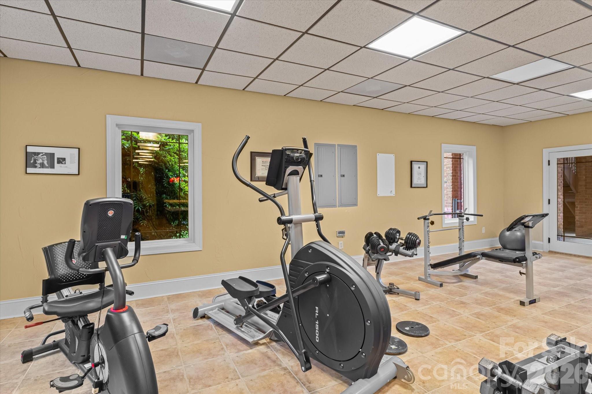 368 Players Ridge Road Hickory, NC 28601 - Photo 32 of 48 a room with gym equipment and a table