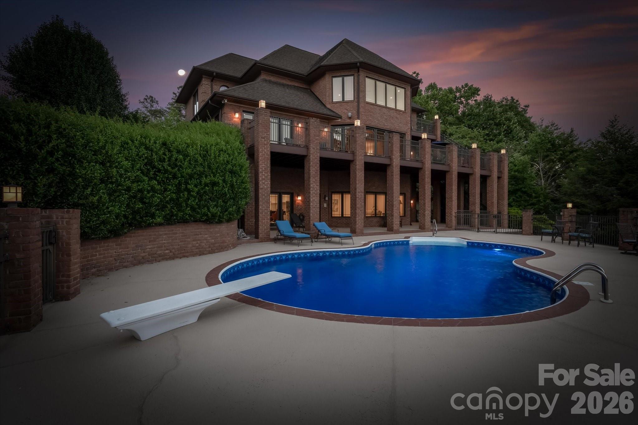368 Players Ridge Road Hickory, NC 28601 - Photo 47 of 48 a front view of house with yard swimming pool and outdoor seating