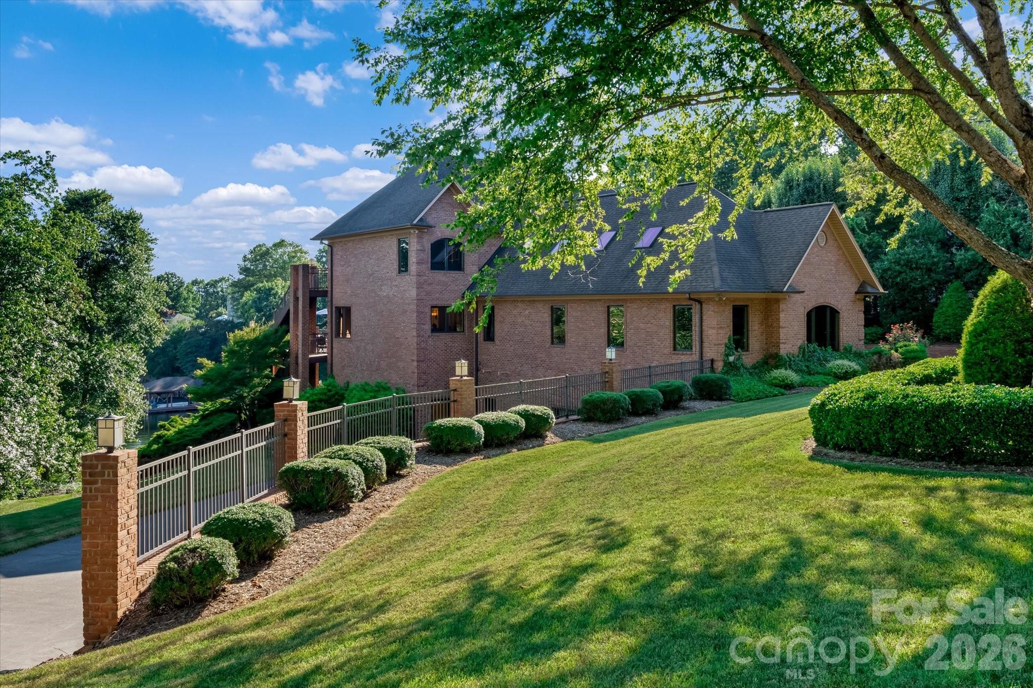 368 Players Ridge Road Hickory, NC 28601 - Photo 5 of 48 a front view of a house with garden