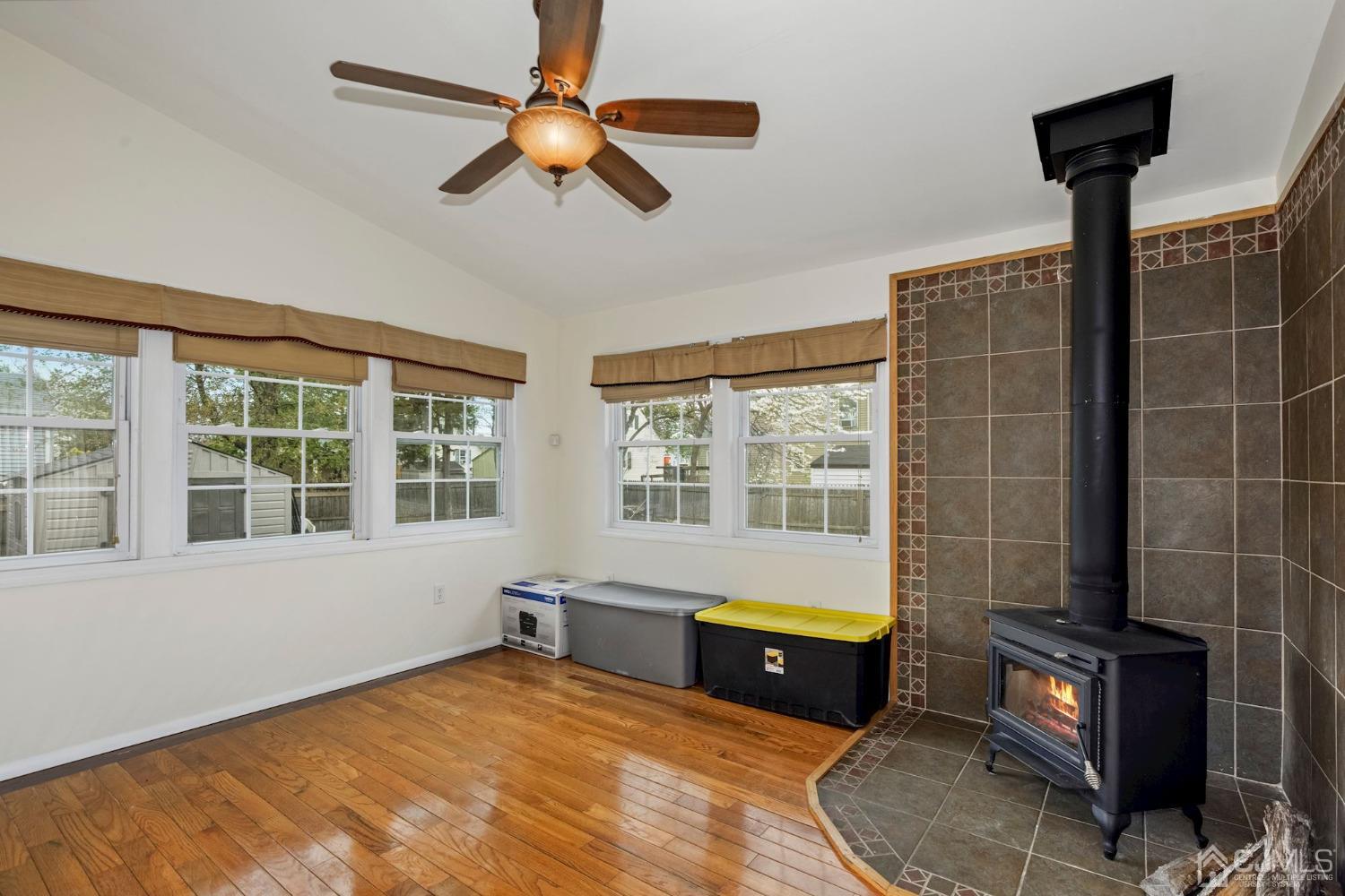 59 Clipper Avenue Edison, NJ 08817 - Photo 11 of 29 a living room with furniture and a floor to ceiling window