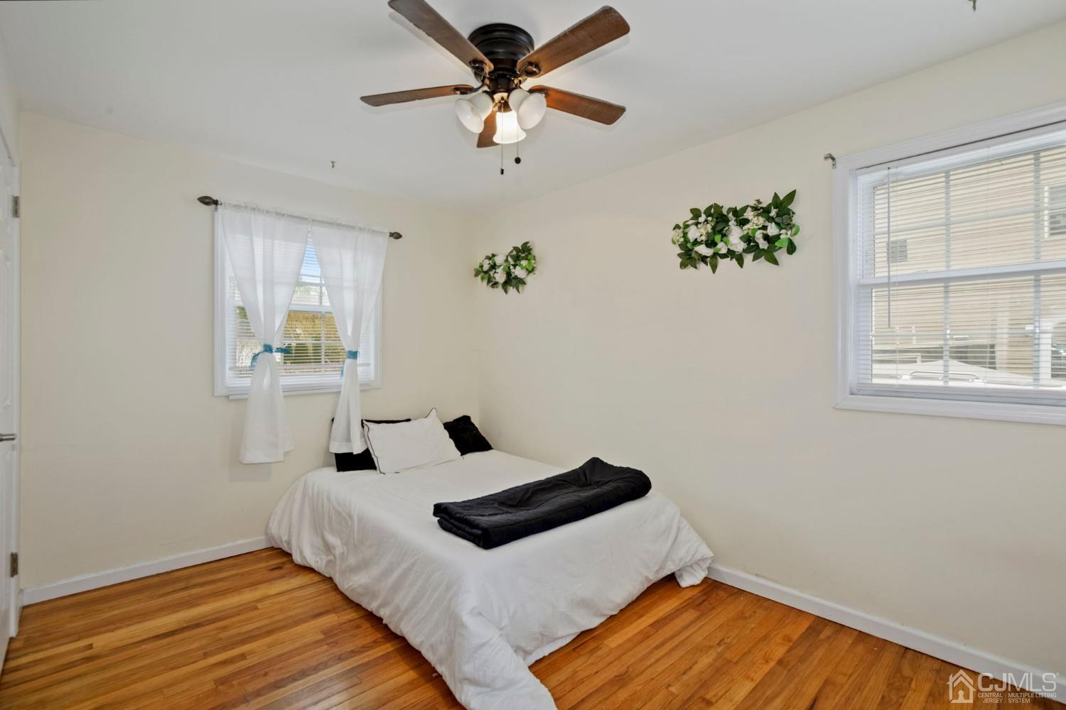 59 Clipper Avenue Edison, NJ 08817 - Photo 12 of 29 a bedroom with a bed and a window
