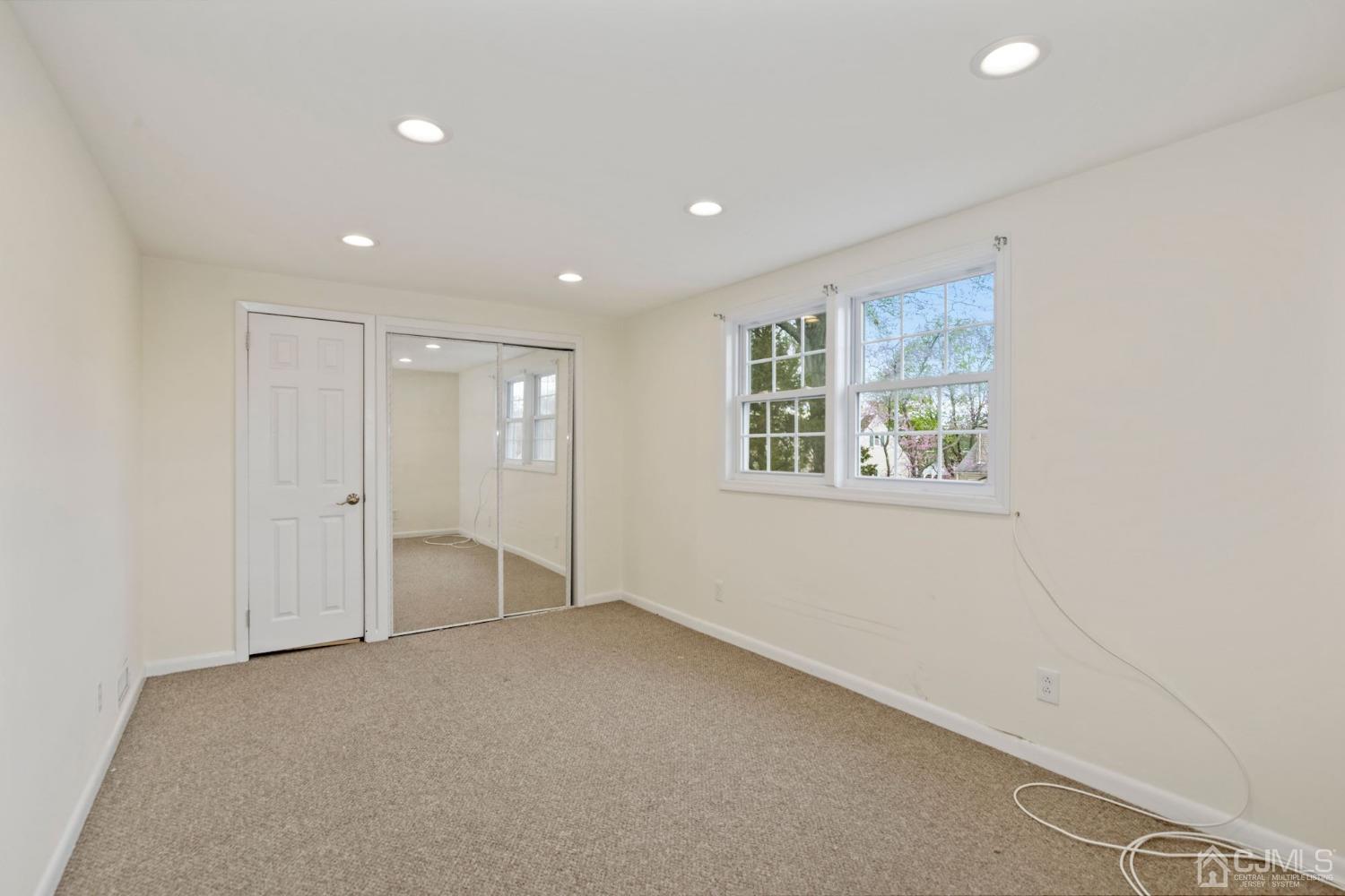 59 Clipper Avenue Edison, NJ 08817 - Photo 17 of 29 a view of an empty room with a window