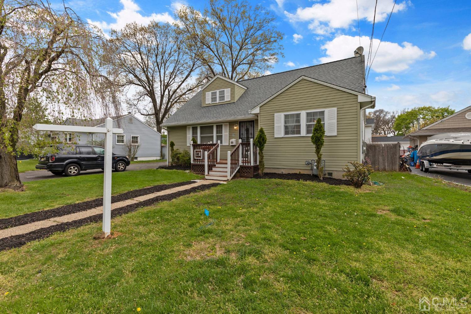59 Clipper Avenue Edison, NJ 08817 - Photo 25 of 29 a front view of a house with a yard