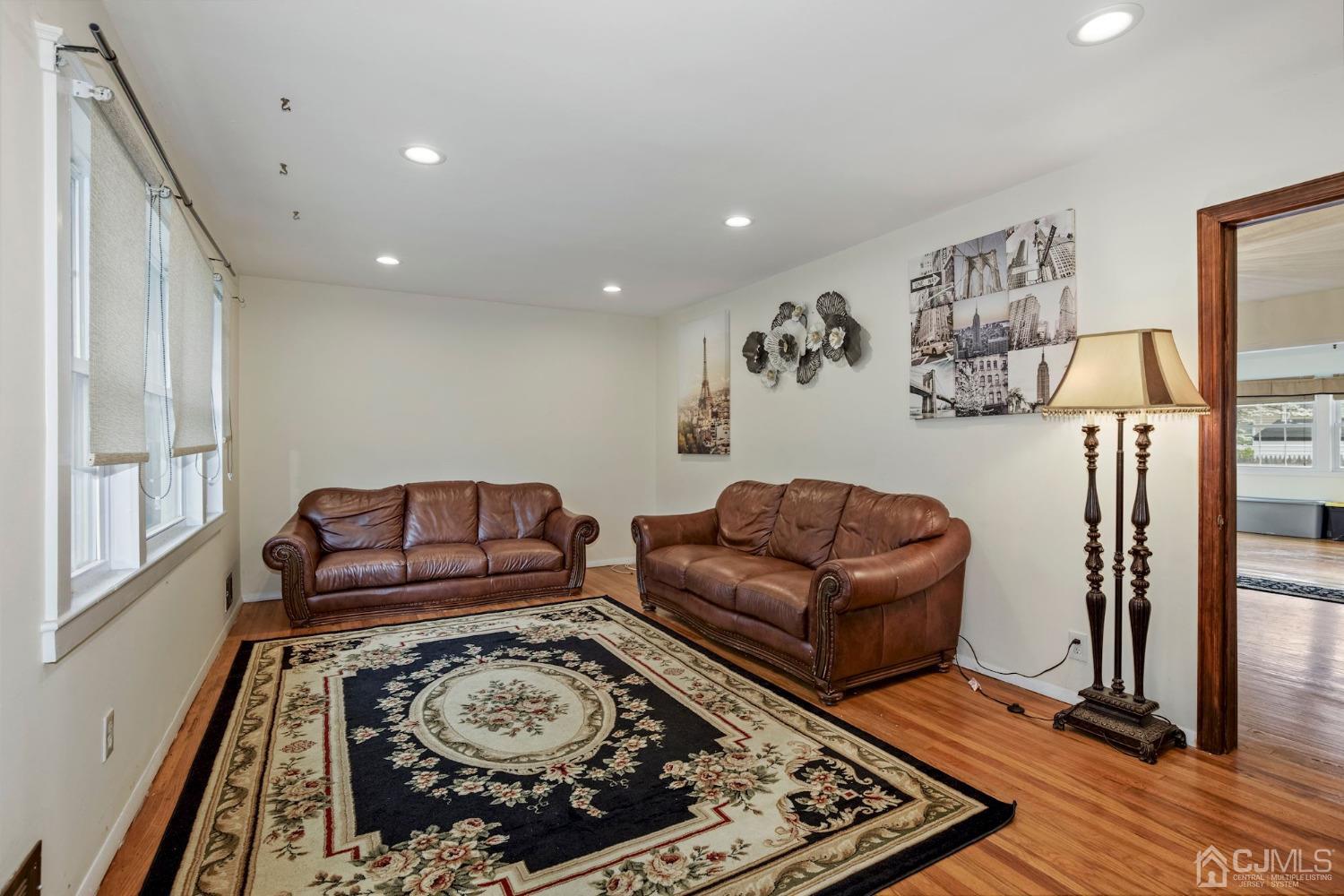 59 Clipper Avenue Edison, NJ 08817 - Photo 5 of 29 a living room with furniture and a rug