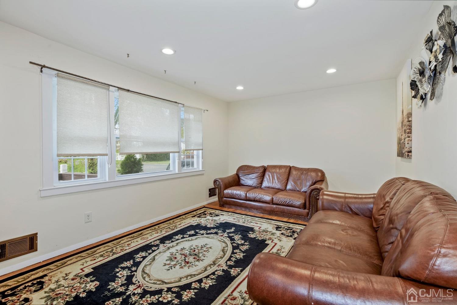 59 Clipper Avenue Edison, NJ 08817 - Photo 6 of 29 a living room with furniture and a window