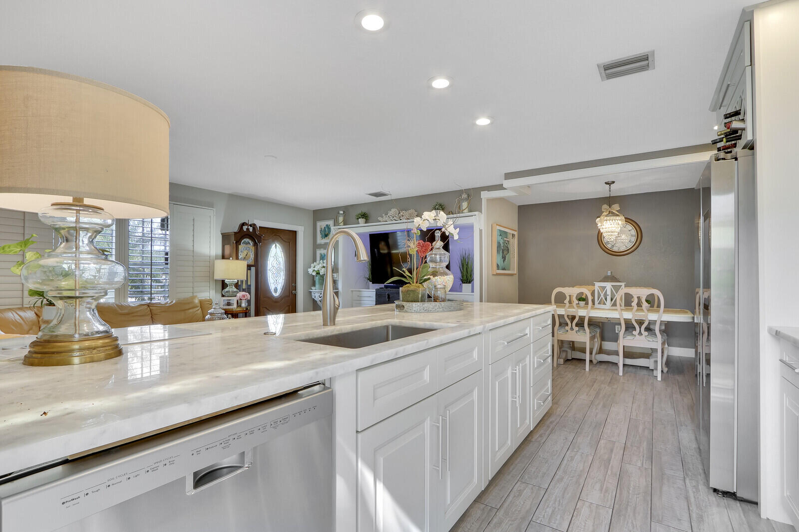 503 North Perry Avenue Jupiter, FL 33458 - Photo 18 of 44 a view of a kitchen from the living room