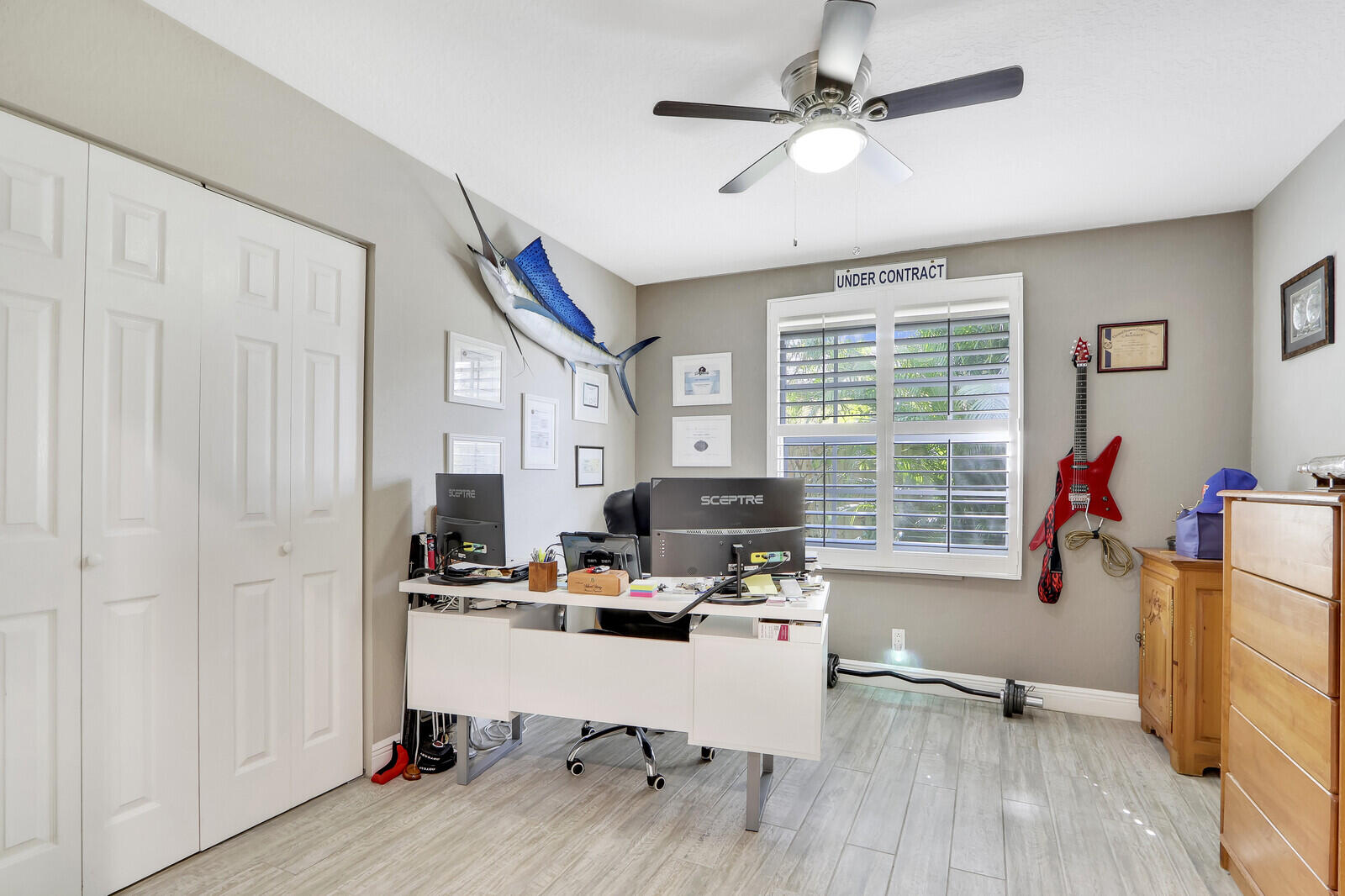 503 North Perry Avenue Jupiter, FL 33458 - Photo 19 of 44 a workspace with wooden floor and a window