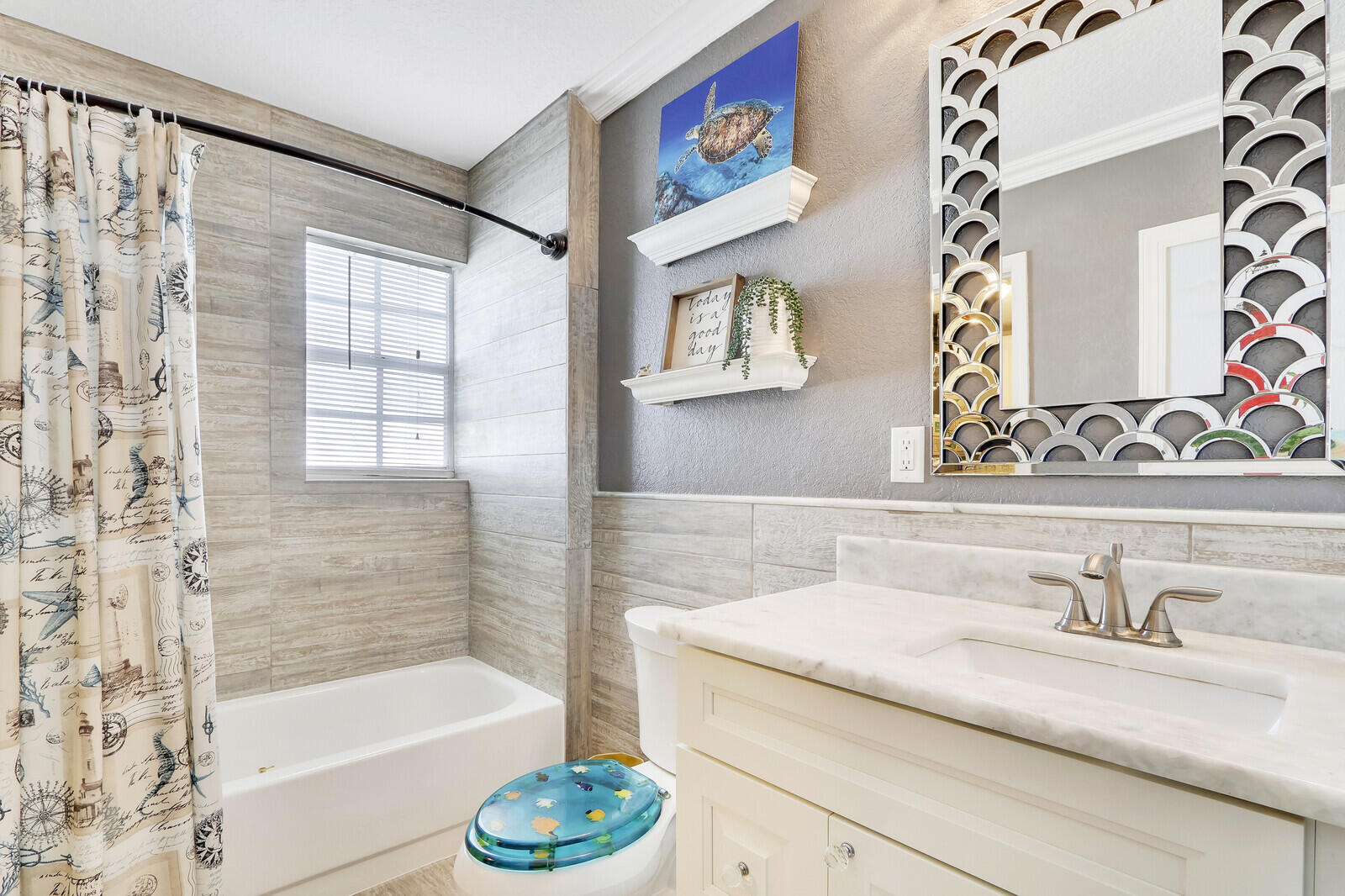 503 North Perry Avenue Jupiter, FL 33458 - Photo 20 of 44 a bathroom with a granite countertop sink a toilet and bathtub