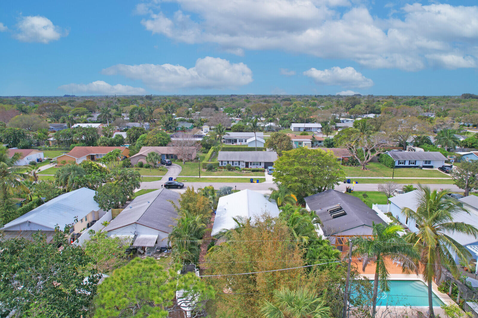 503 North Perry Avenue Jupiter, FL 33458 - Photo 36 of 44 an aerial view of a houses with a swimming pool
