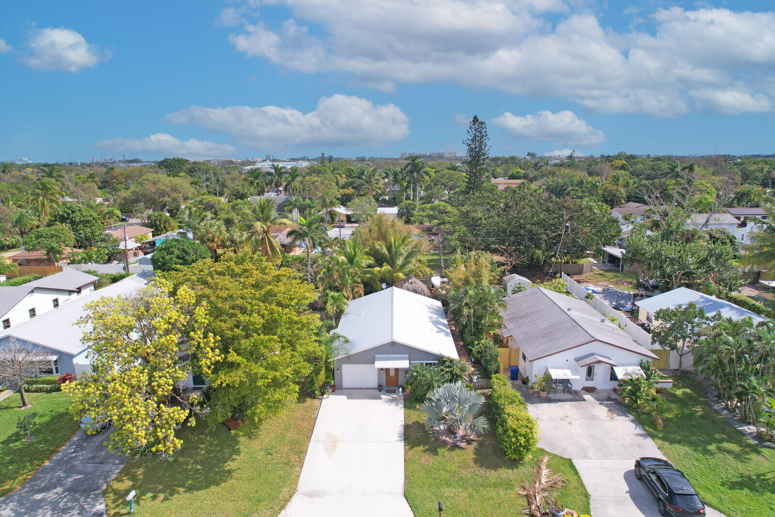 503 North Perry Avenue Jupiter, FL 33458 - Photo 37 of 44 an aerial view of residential houses with outdoor space and trees
